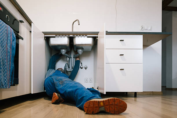 Professional Emergency Plumber technician working in Livonia, NY